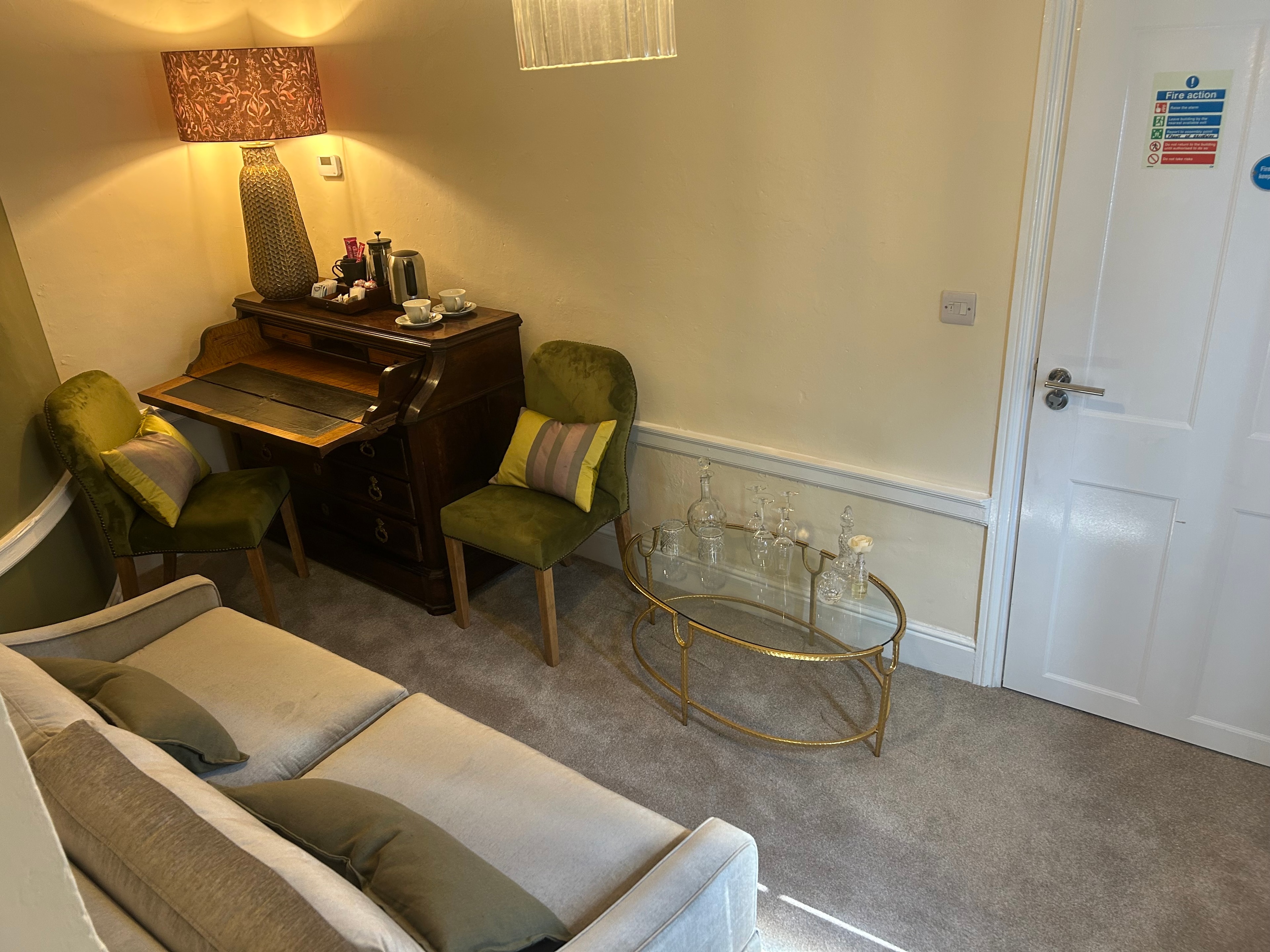 The Library Suite — warm traditional room with king-size bed